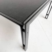 Black granite side table or coffee table from the 1980’s