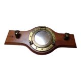 Marine style coat rack with porthole mirror