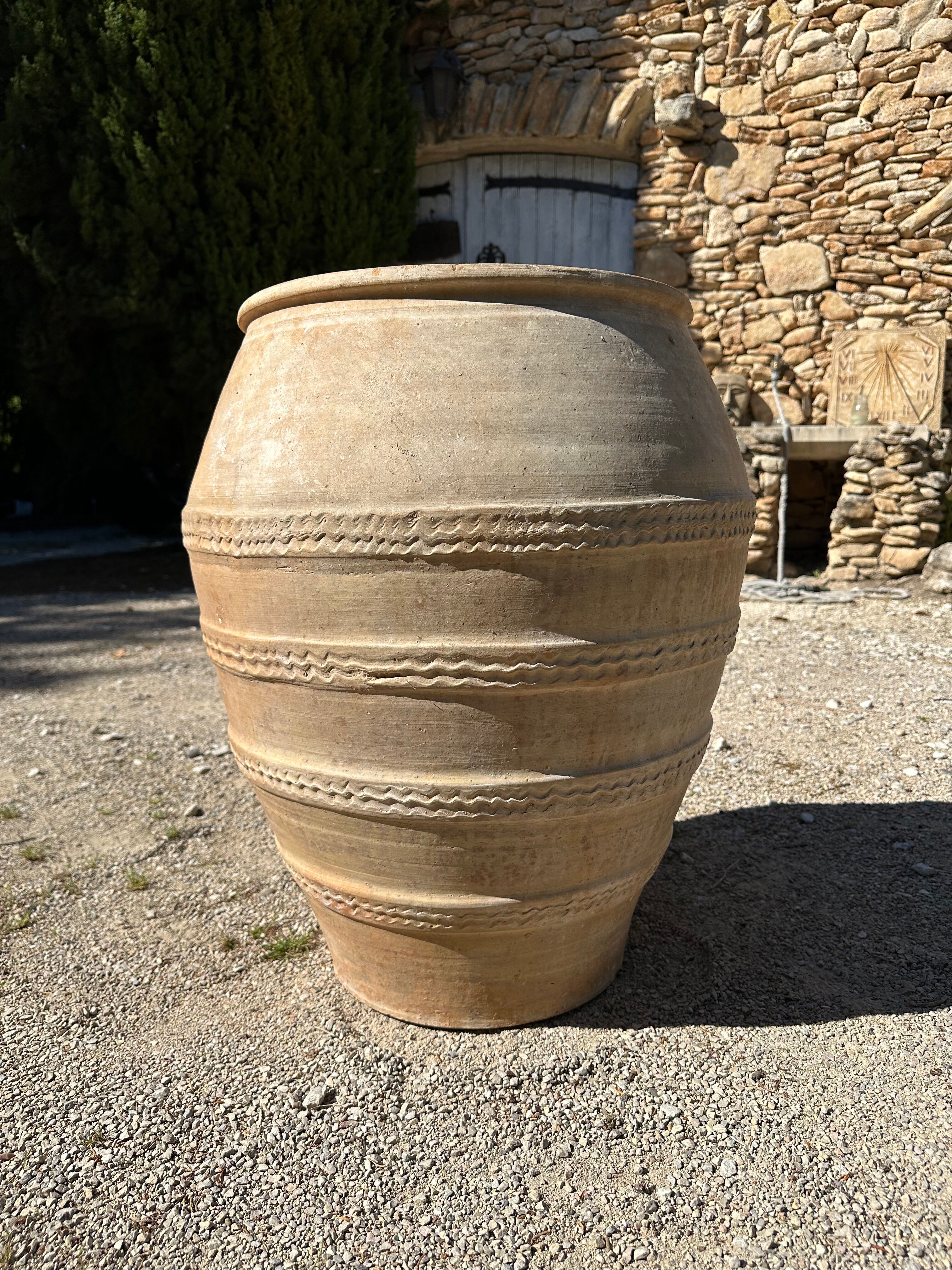 Ancient terracotta pottery jar from the 19th century.