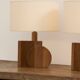 Pair of geometric handcrafted lamps in solid oak circa 1970.