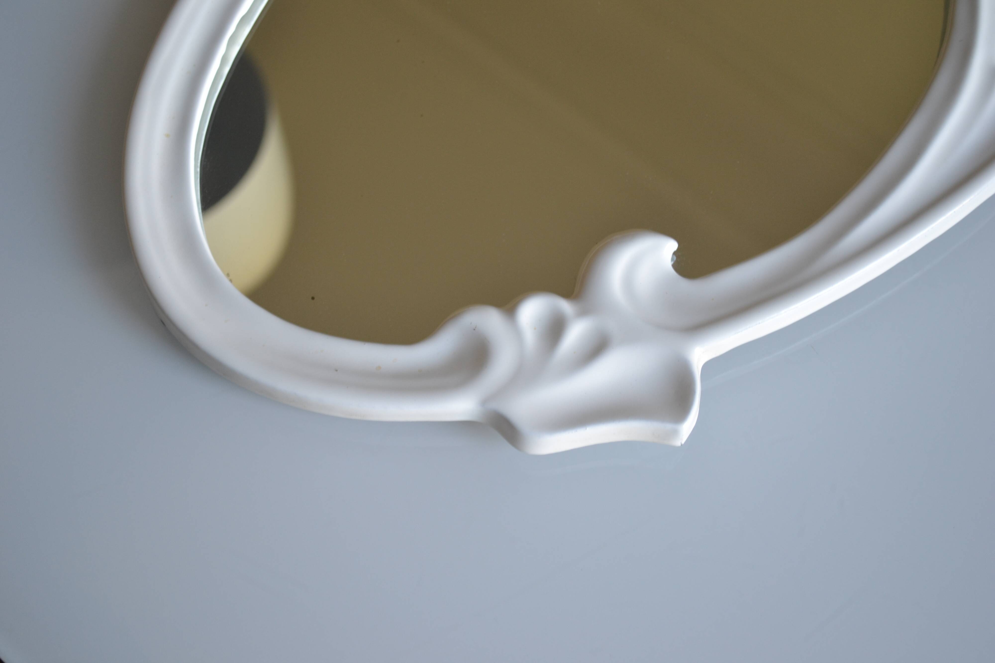 Oval mirror in art nouveau jugendstil style in enamelled cast iron 49 x 29