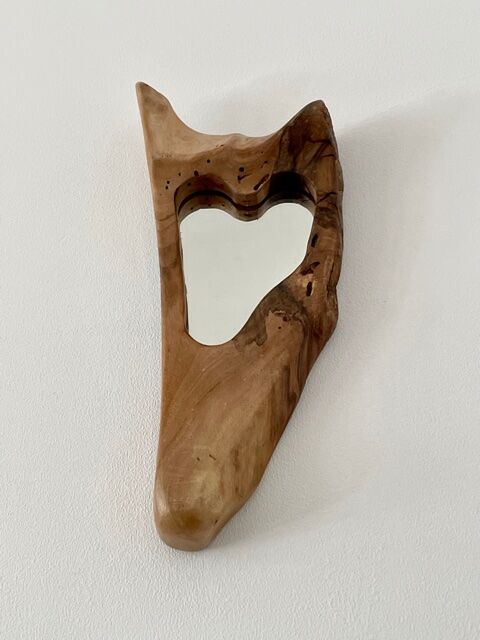 Brutalist mirror made of olive wood