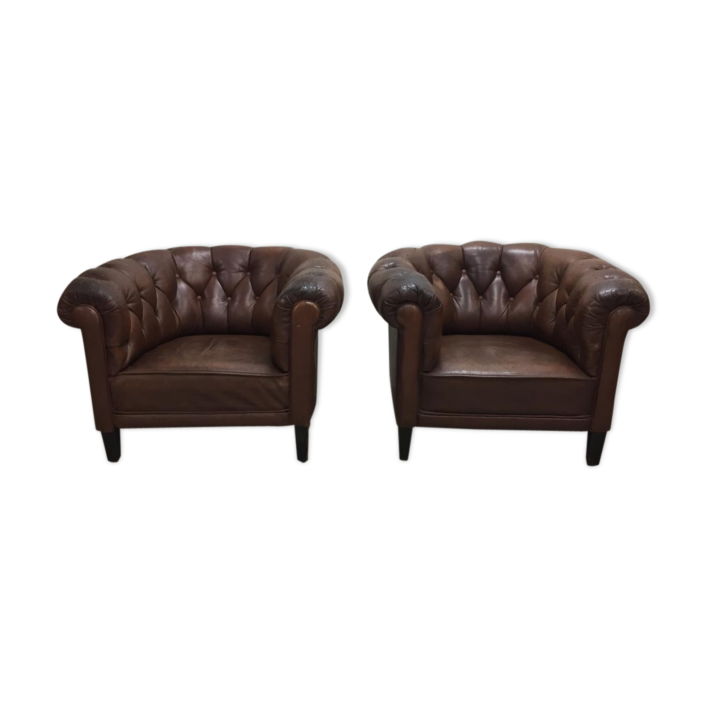 Paire de fauteuils cuir