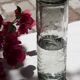 Carafe and glass made of blown and engraved glass.