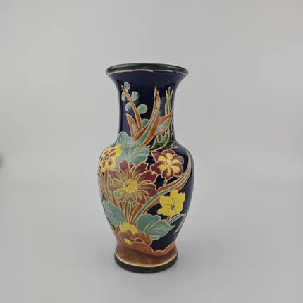 Large multicoloured ceramic vase with floral decoration signed NT.