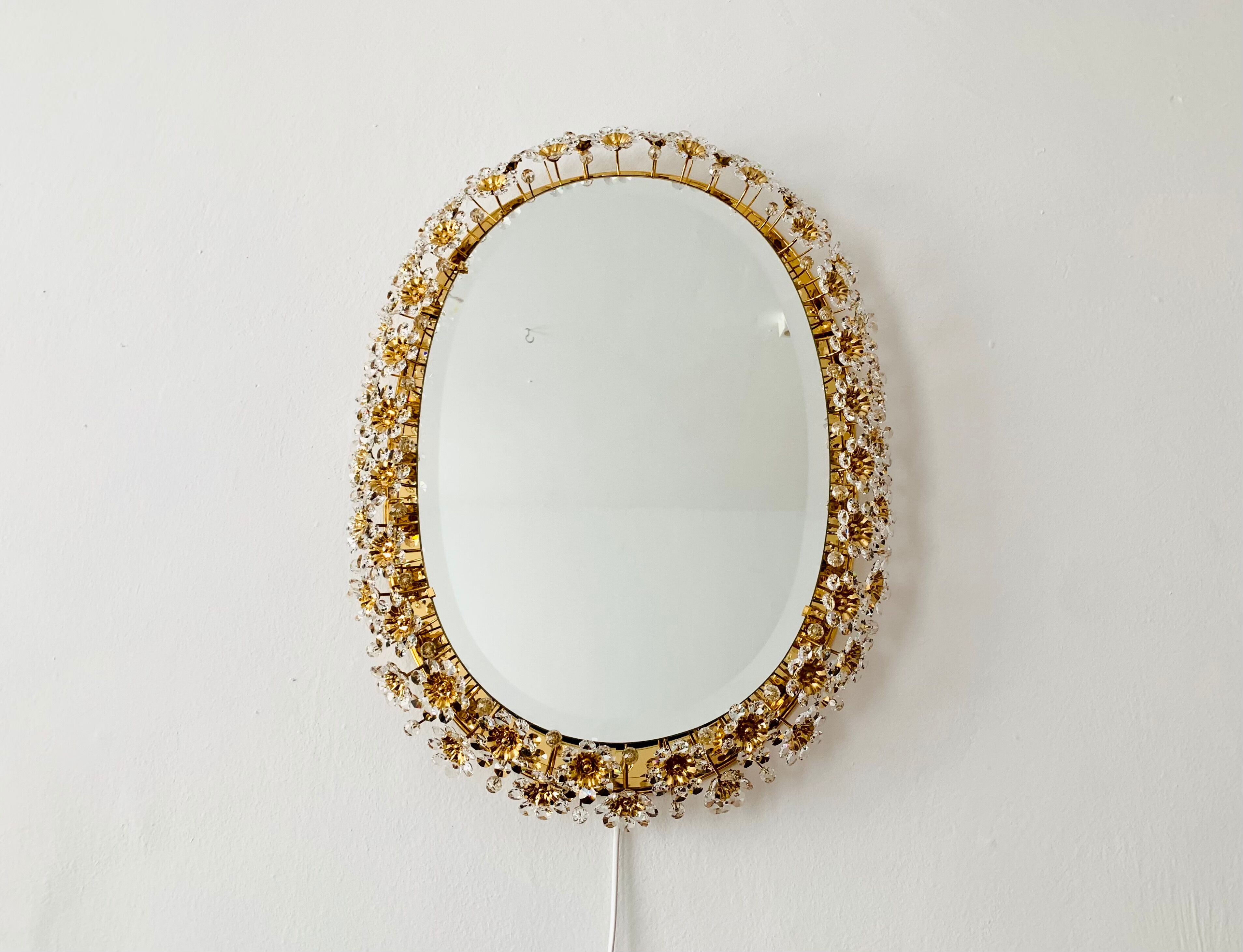 Illuminated floral mirror by Palwa