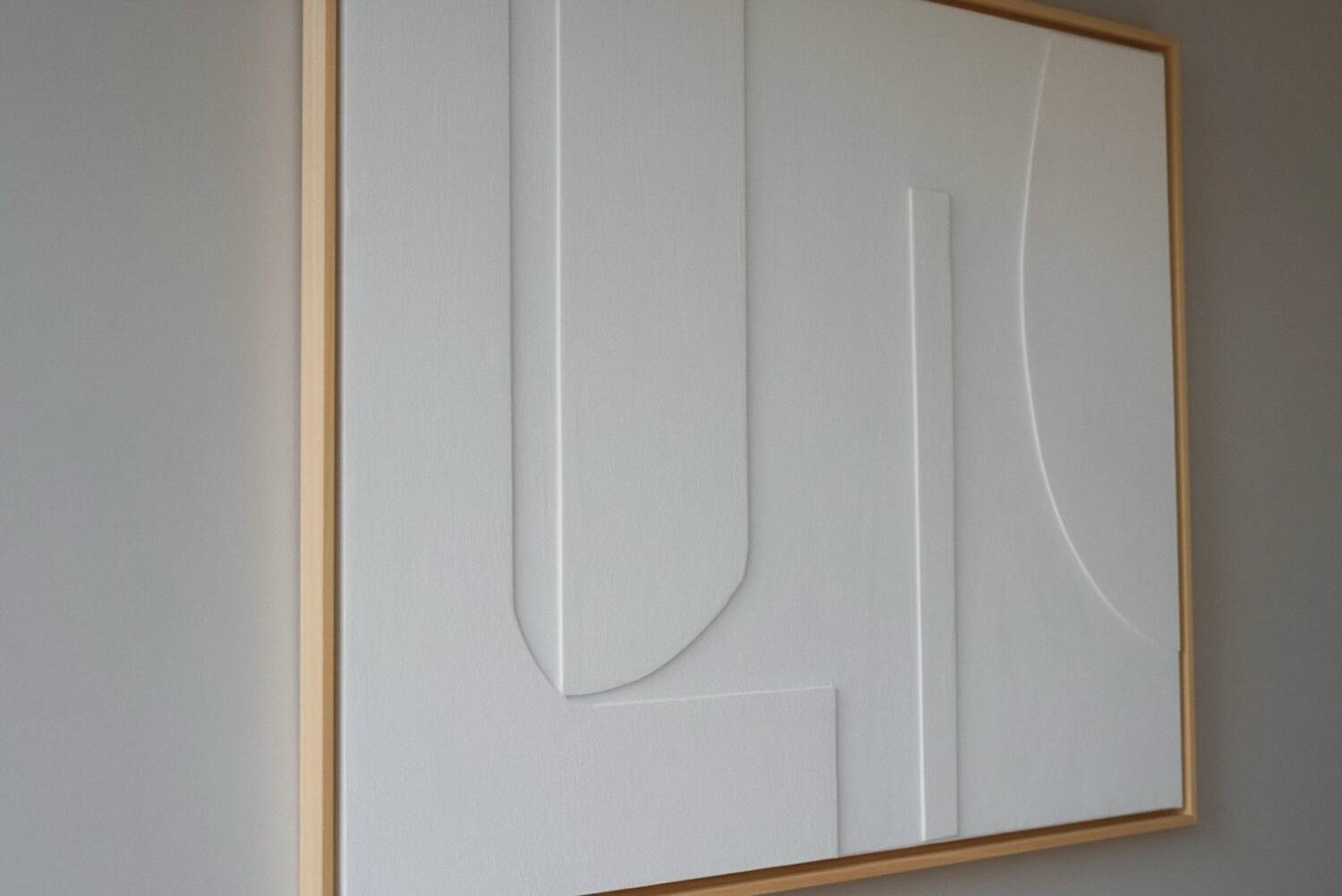 Minimalist white relief panel