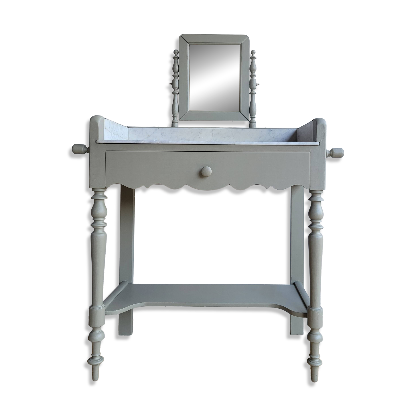 Antique wooden dressing table with marble top and mirror.