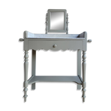 Antique wooden dressing table with marble top and mirror.