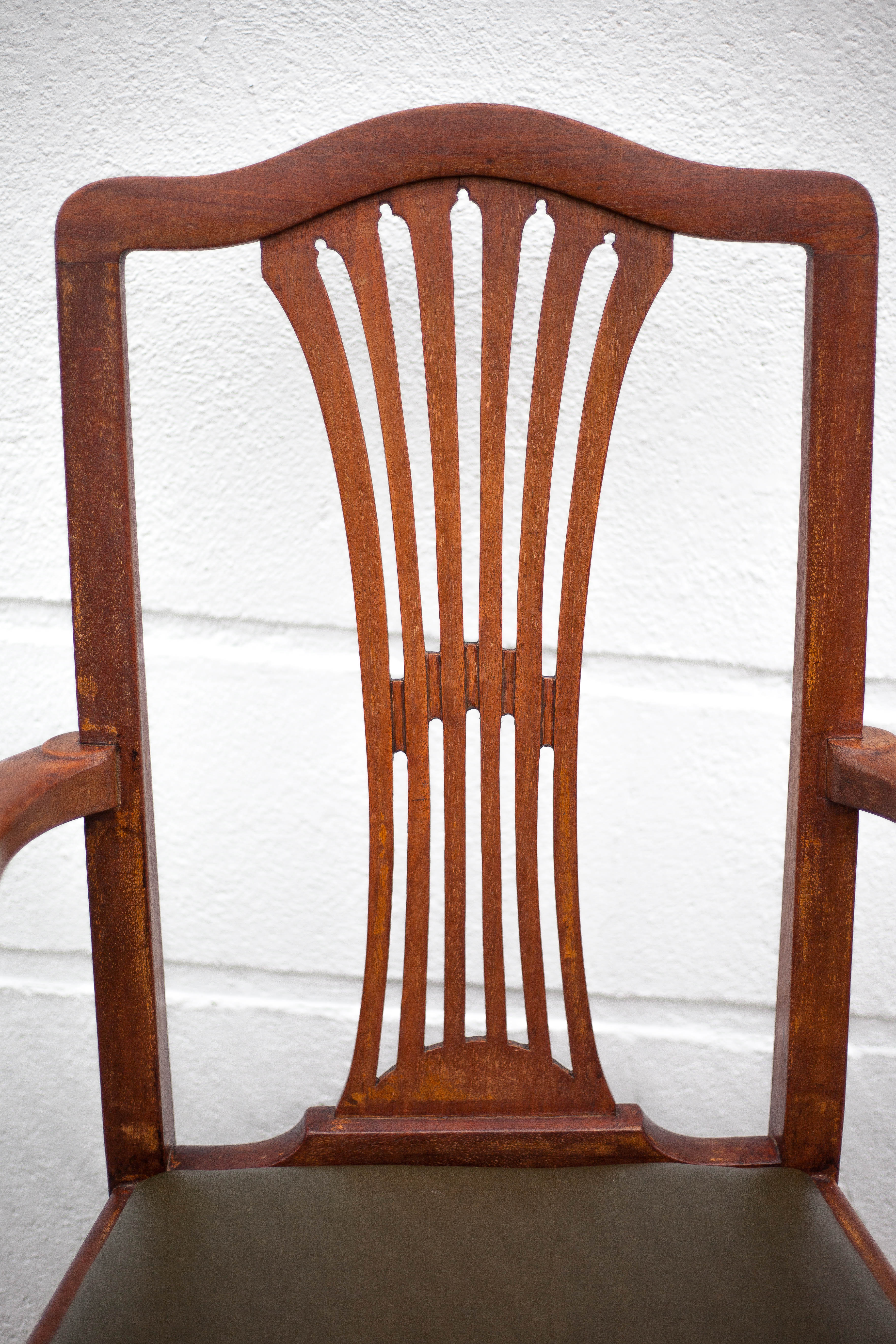 Art Nouveau armchair, wooden armchair with green leather seat, guimard style legs, living room, library