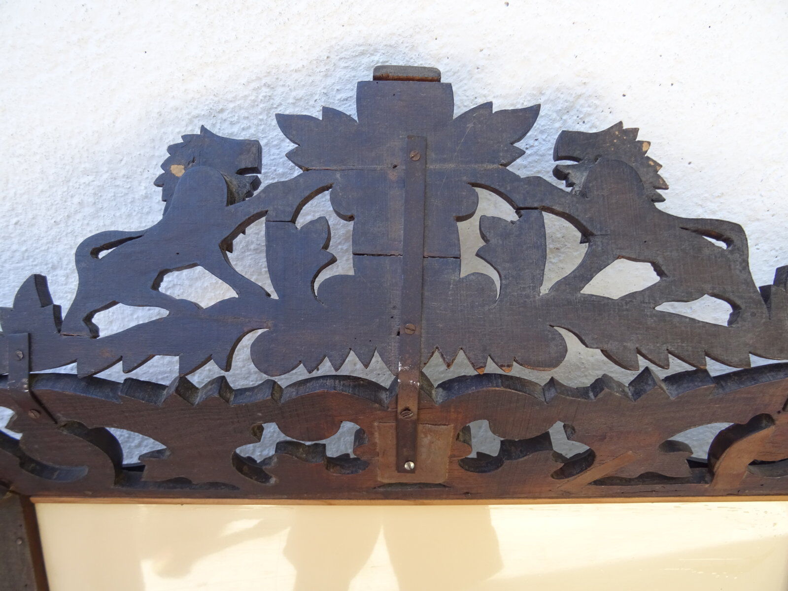 Miroir sculpté fronton lions