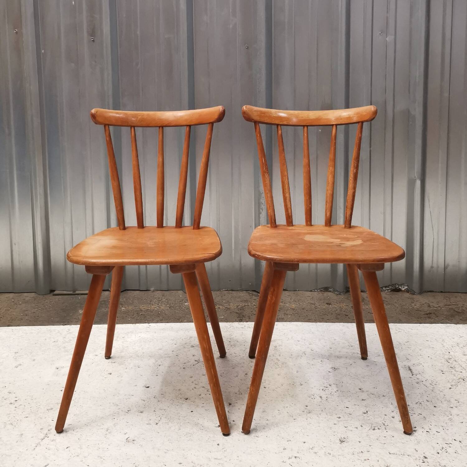 Pair of bistro chairs with bars