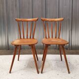 Pair of bistro chairs with bars