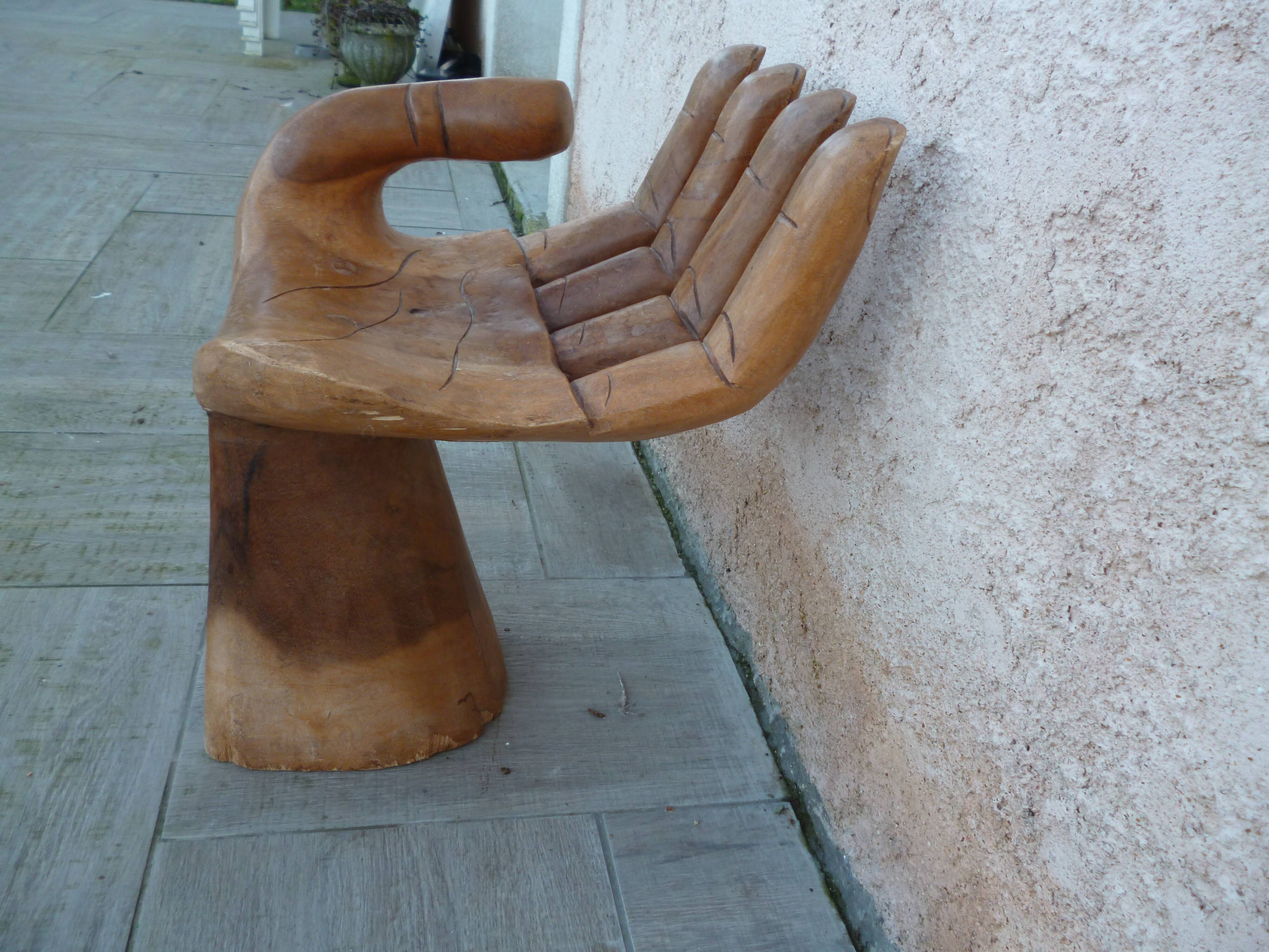 Vintage wooden hand-shaped chair