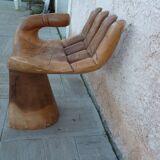 Vintage wooden hand-shaped chair