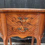Pair of kidney bedside tables