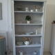 Pearl grey patinated bookcase