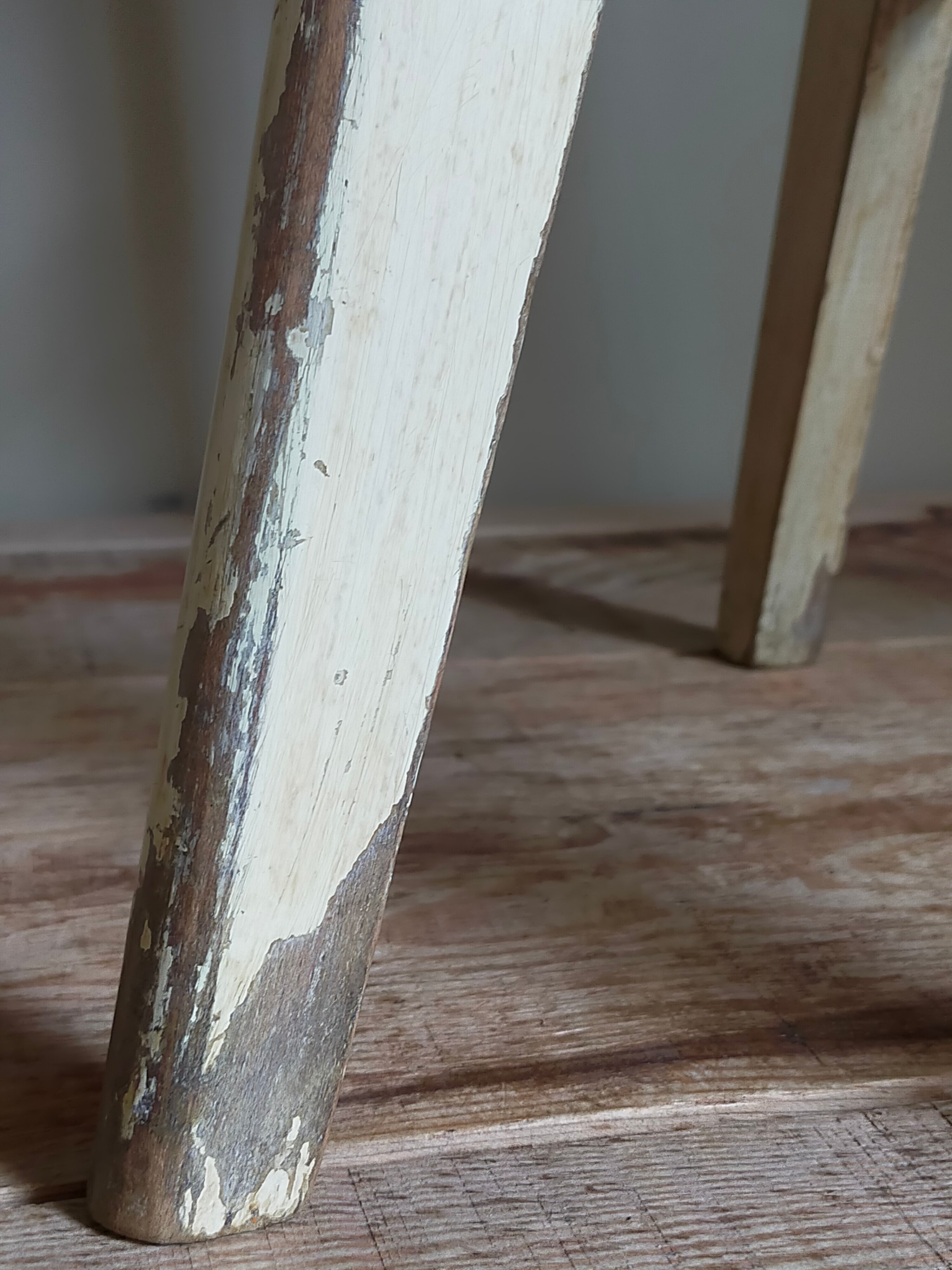 Old workshop stool in patinated solid wood
