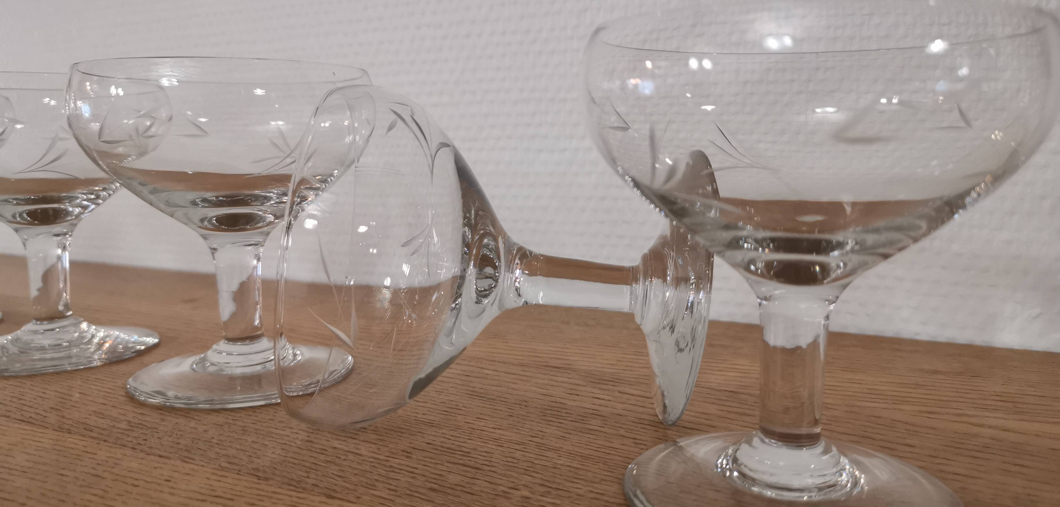 Set of 7 vintage engraved champagne glasses