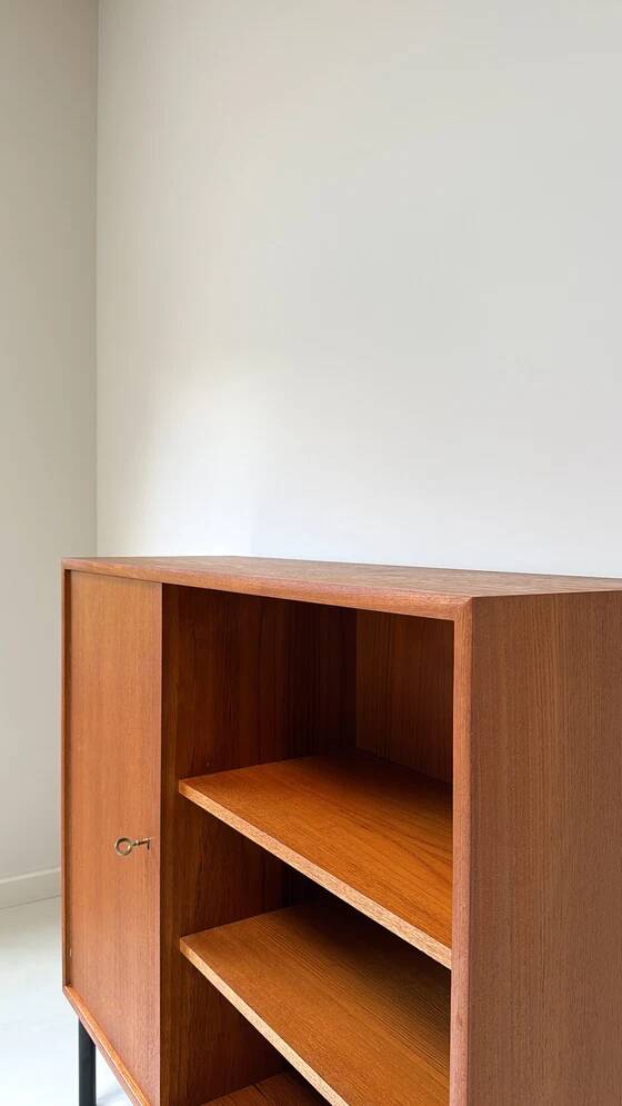 Vintage wooden cabinet with shelves and 1 door
