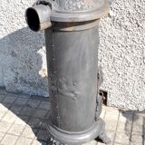 Poêle décoratif ancien en fonte noir Germare charbon bois