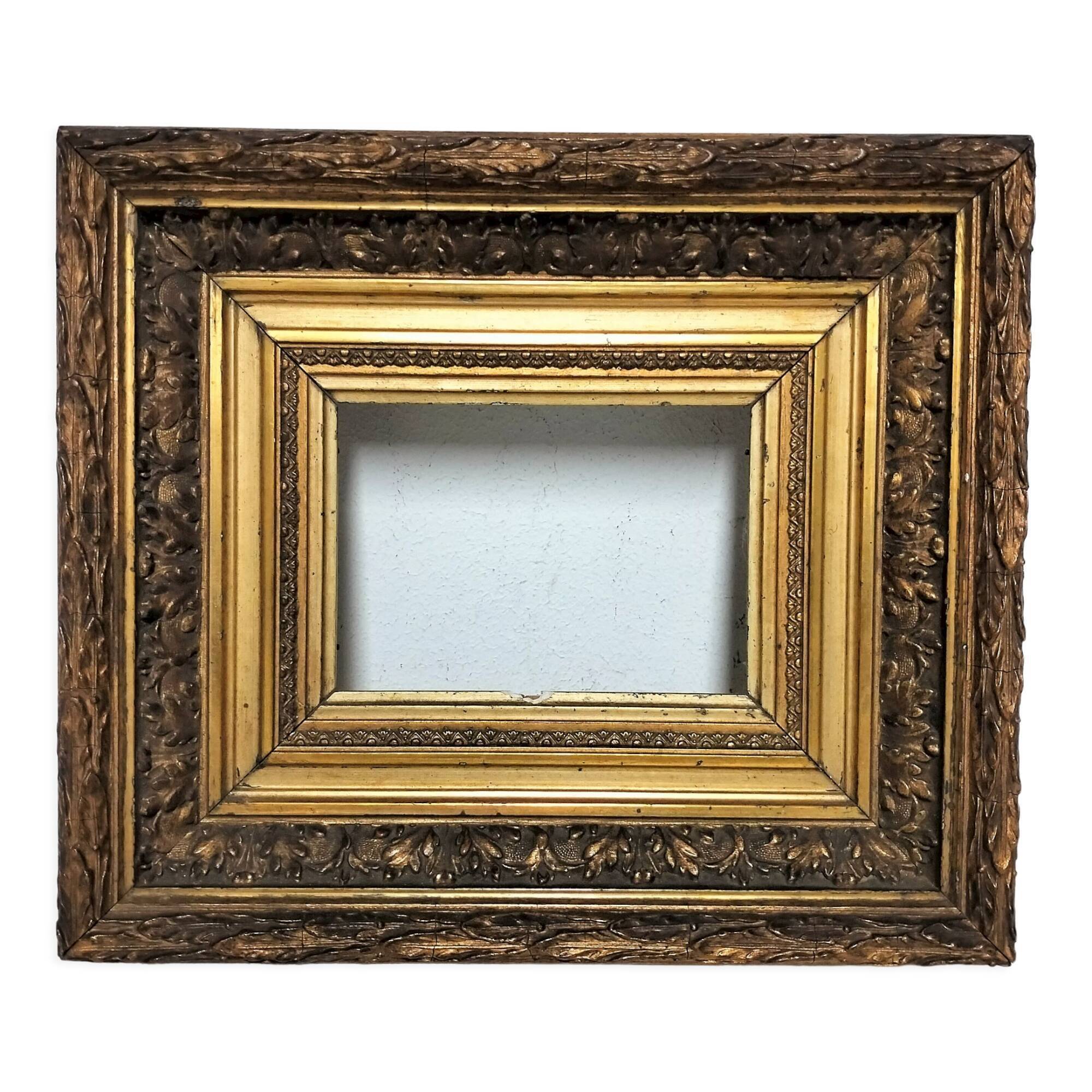 Frame wood and gilded stucco