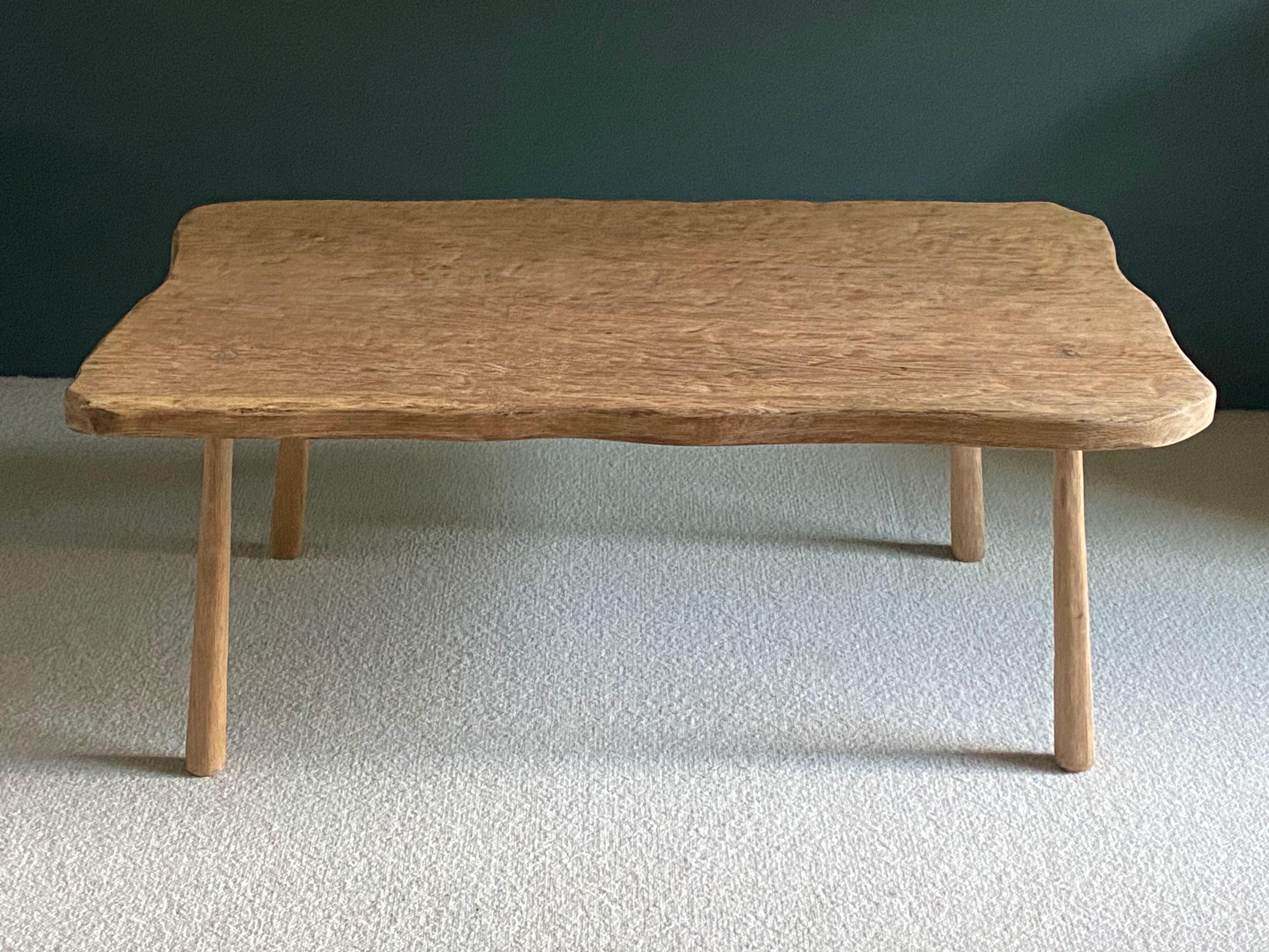 Free-form raw wood coffee table
