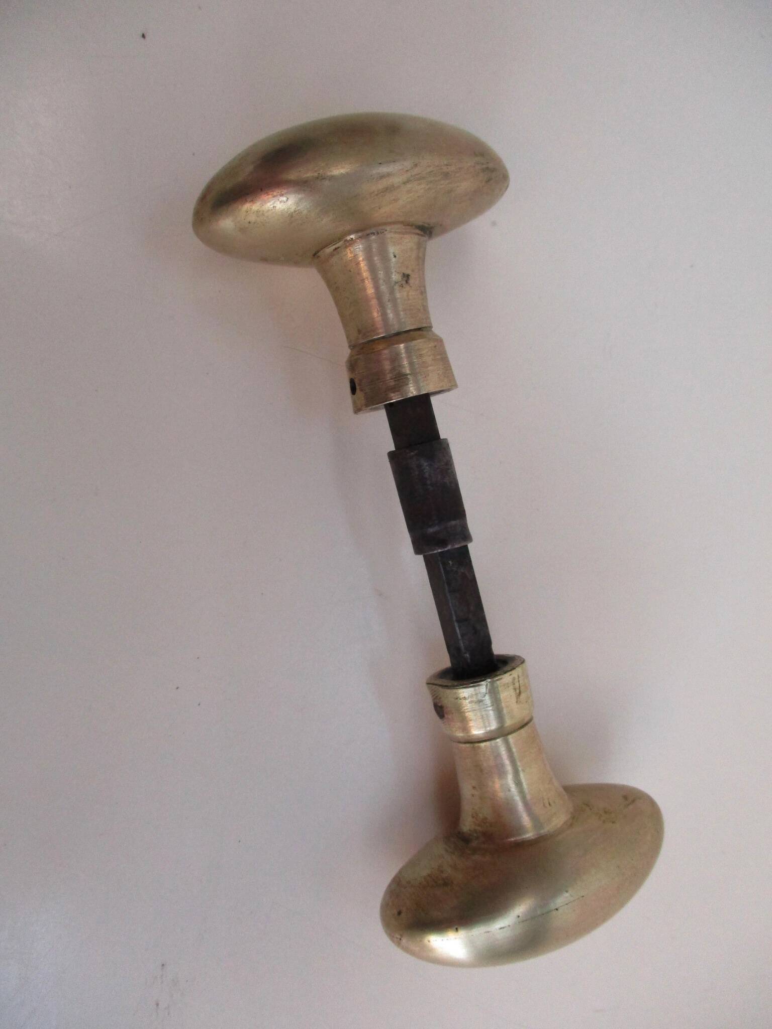 Antique oval brass door handles
