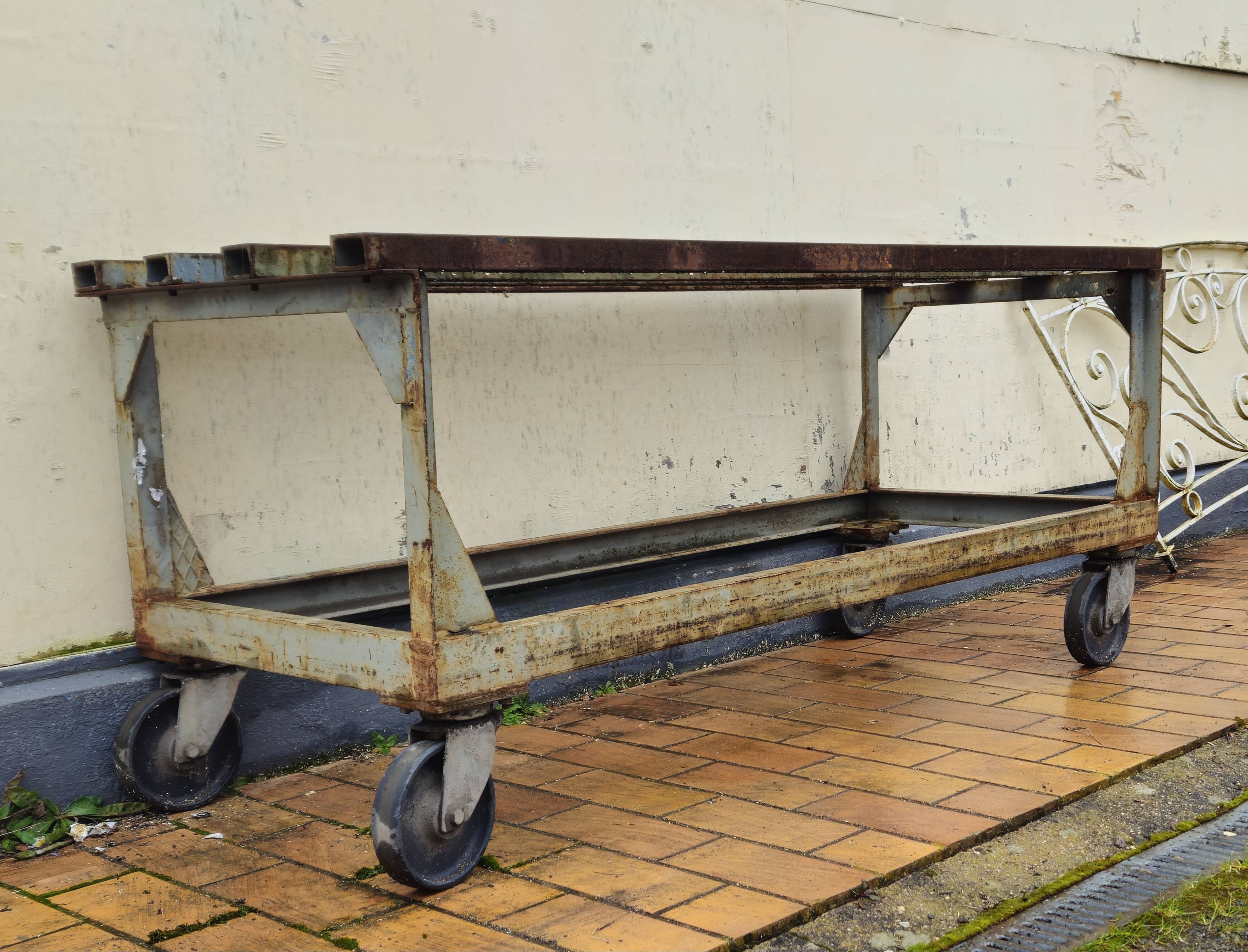 Metal industrial table on wheels, mid-20th century