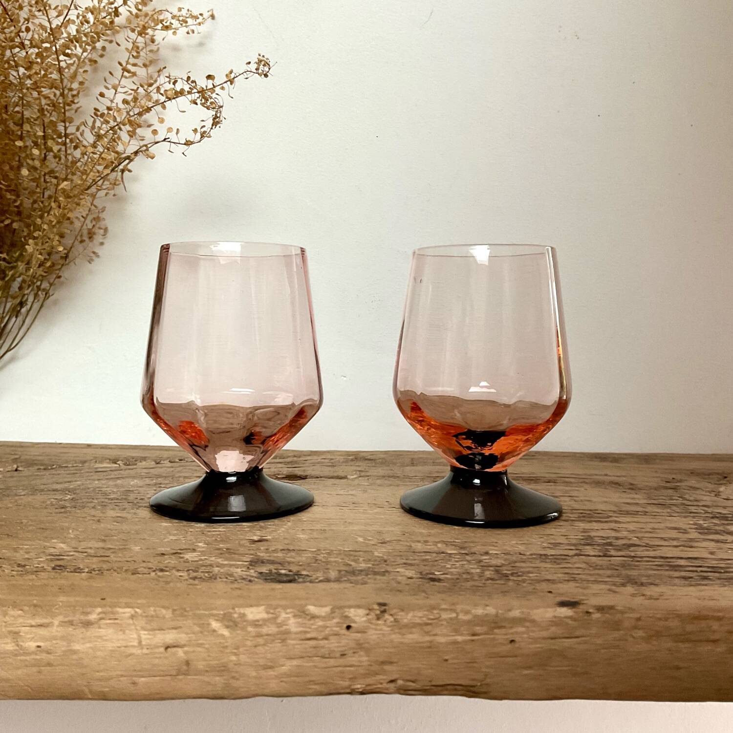 6 small pink glasses with black stem
