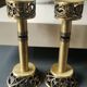 Pair of Hebrew Candlesticks. In antique gold-plated brass. Signed FFS Israel