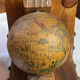 Pair of wooden bookends, rotating globes