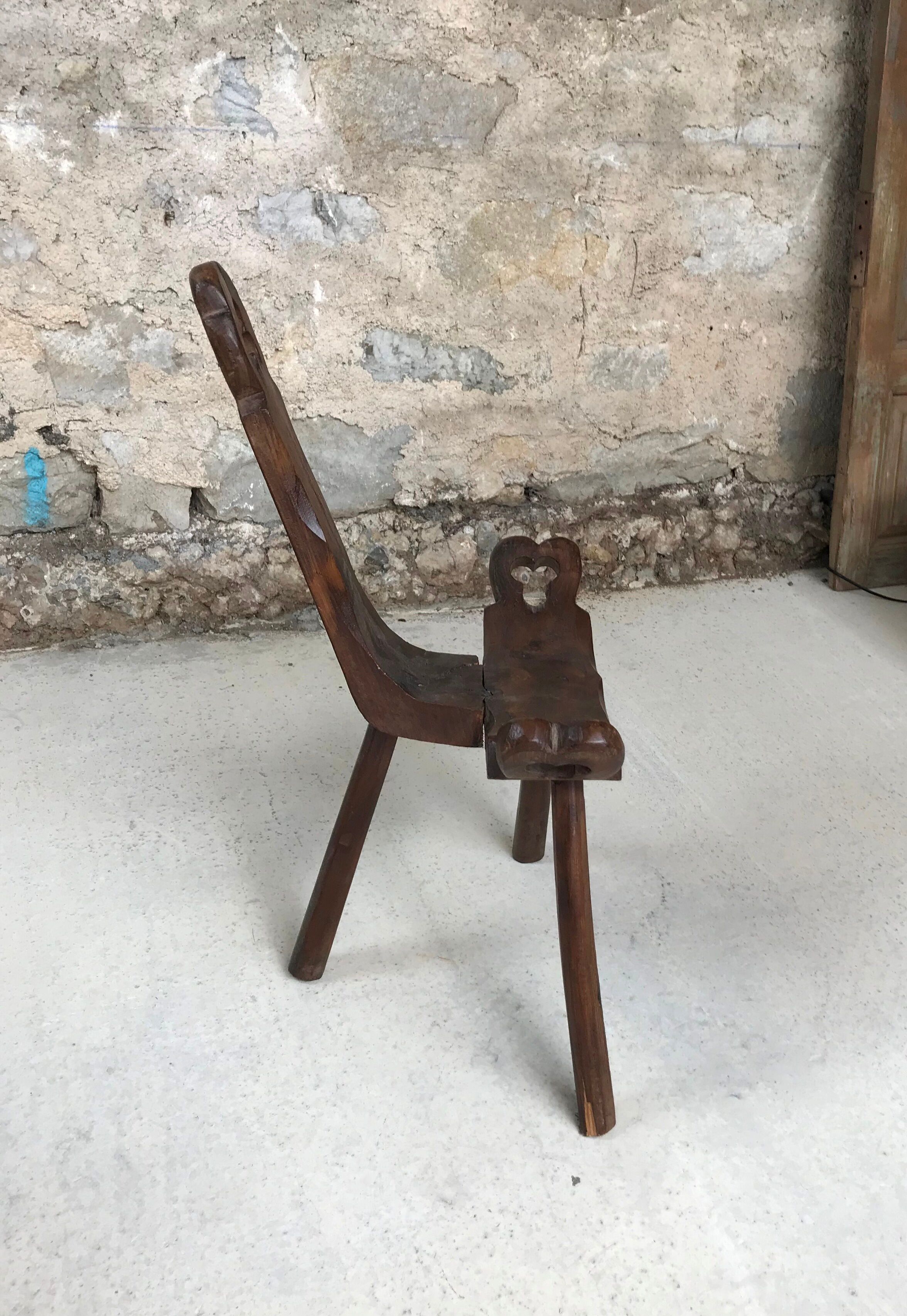 Tripod mountain chair carved wood brutalist 50s design