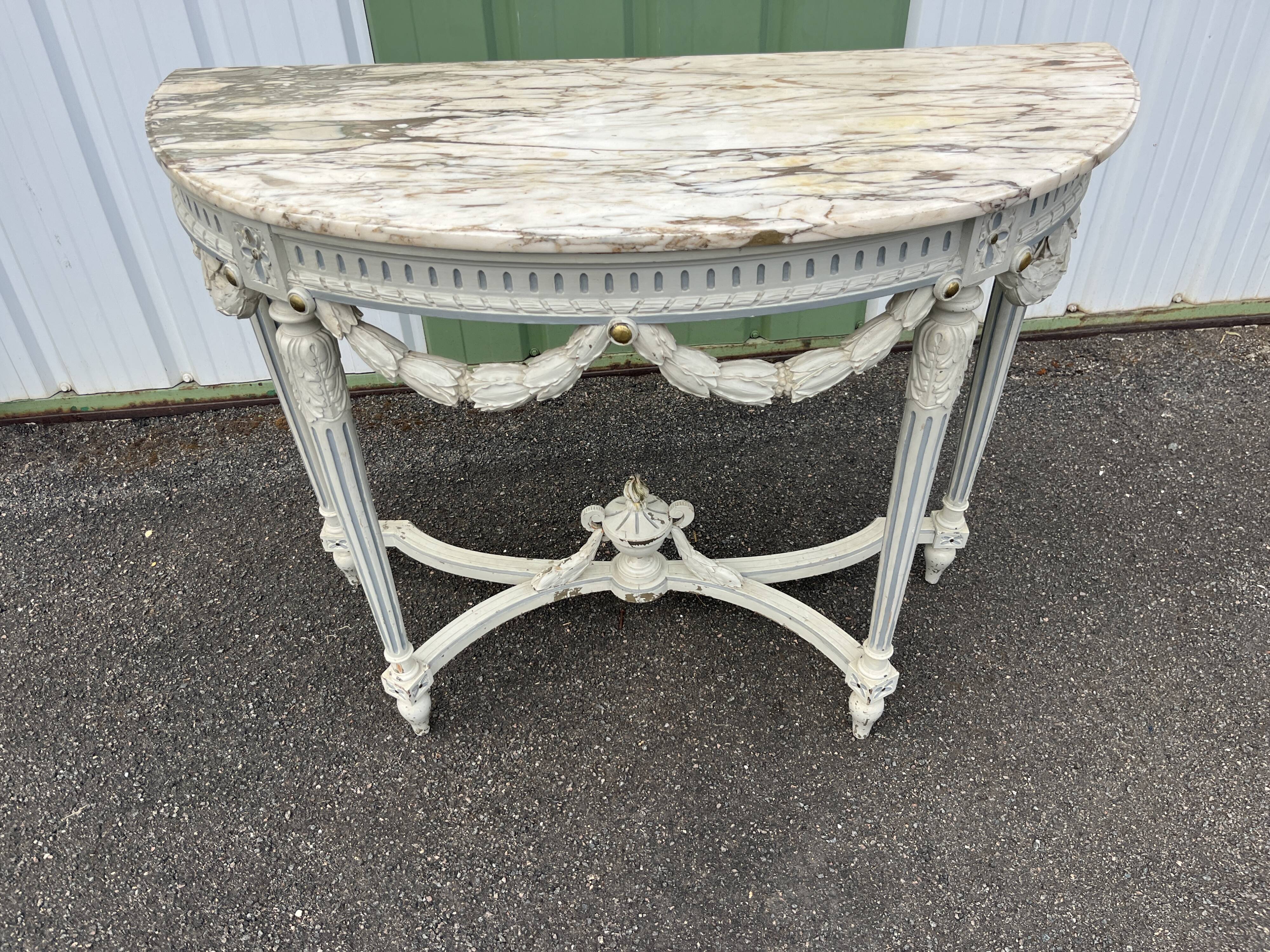 Louis XVI style half-moon console table with carved and painted wood and marble top