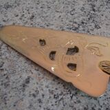 Old gold metal pie shovel