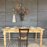 Old farmhouse table in raw wood