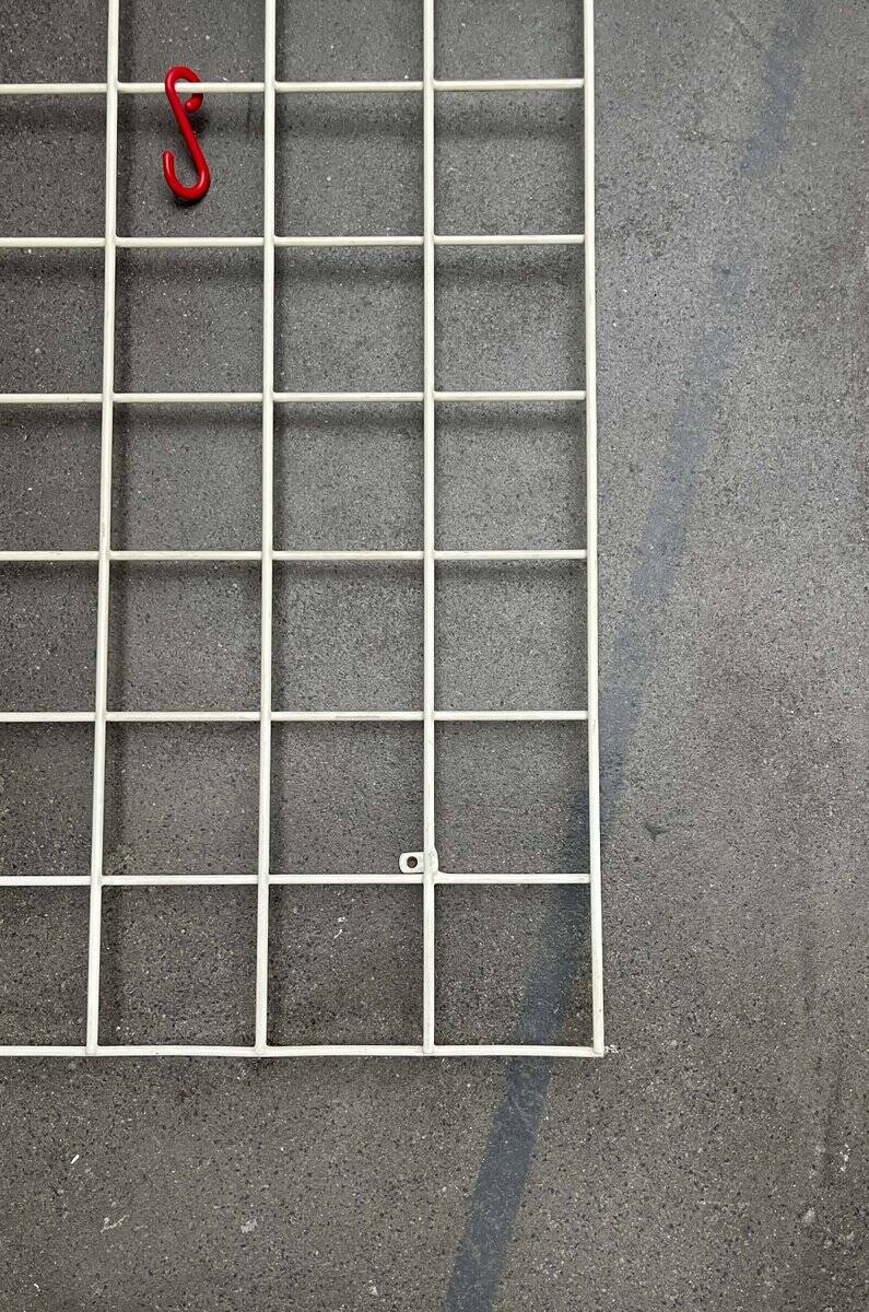 Minimalist white wire coat rack from mid-century Germany, 1960s.