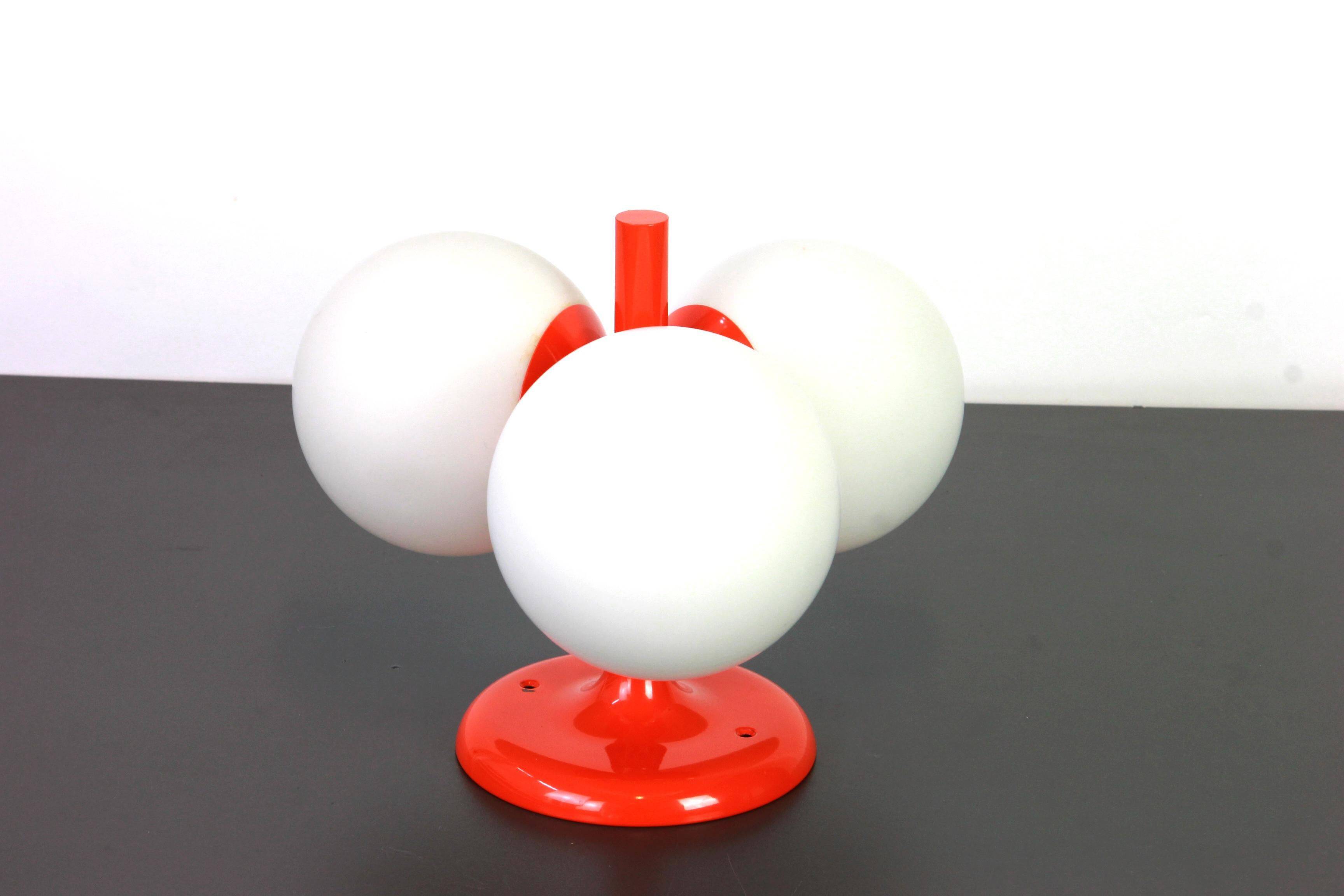 Small mid-century wall sconce in orange by Kaiser, Germany, 1960s