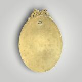 Antique oval wall mirror in gilded resin – Louis XVI knot –