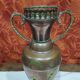 Vase style oriental ou amphore en cuivre et décor en laiton