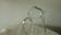 Crystal jug with a spout and handle.