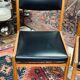 2 Scandinavian-style natural wood chairs, black trim