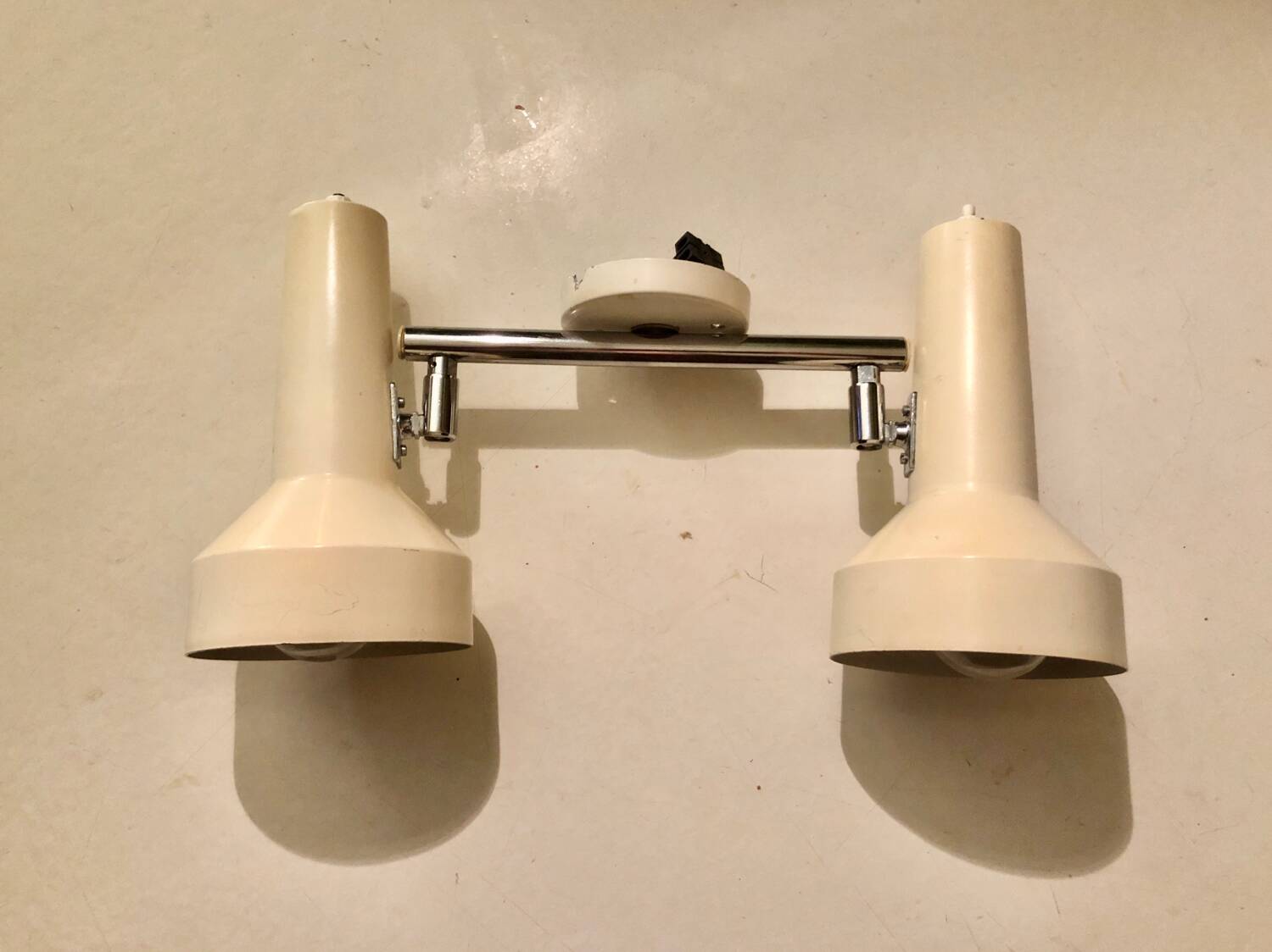 Metal wall lights, 1970.