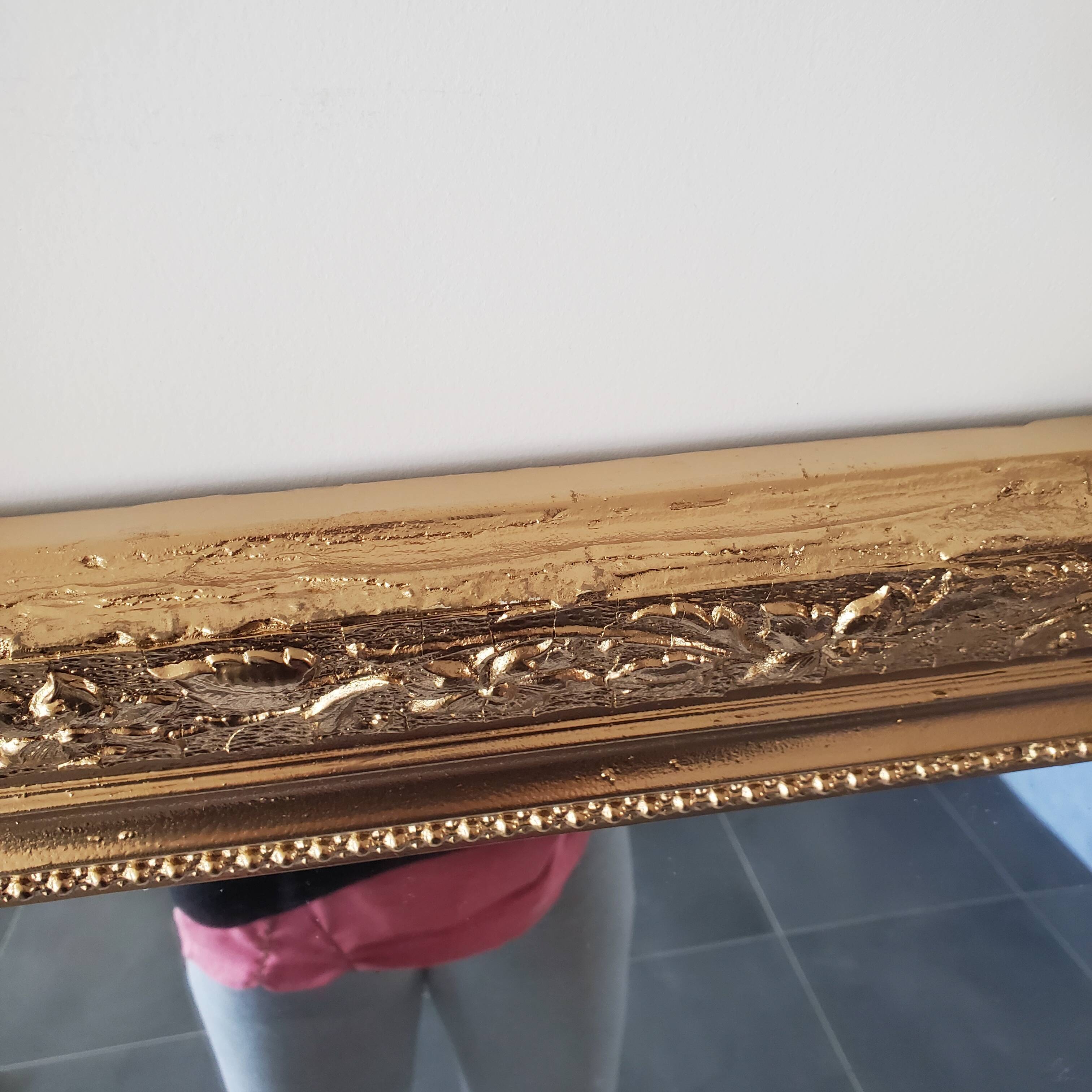 Antique mirror with gilded wood crests