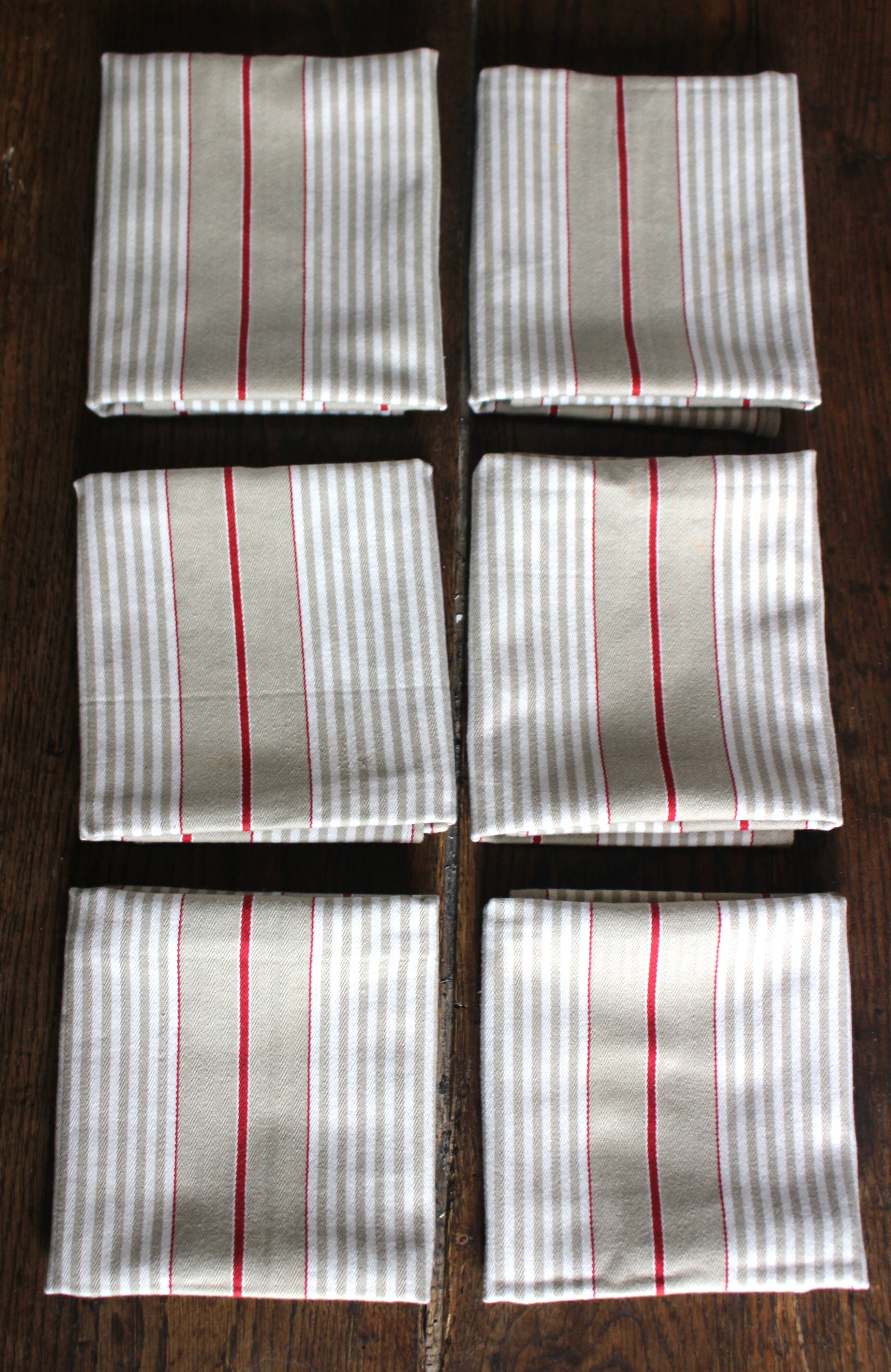 6 beige and red mattress cloth napkins