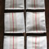 6 beige and red mattress cloth napkins