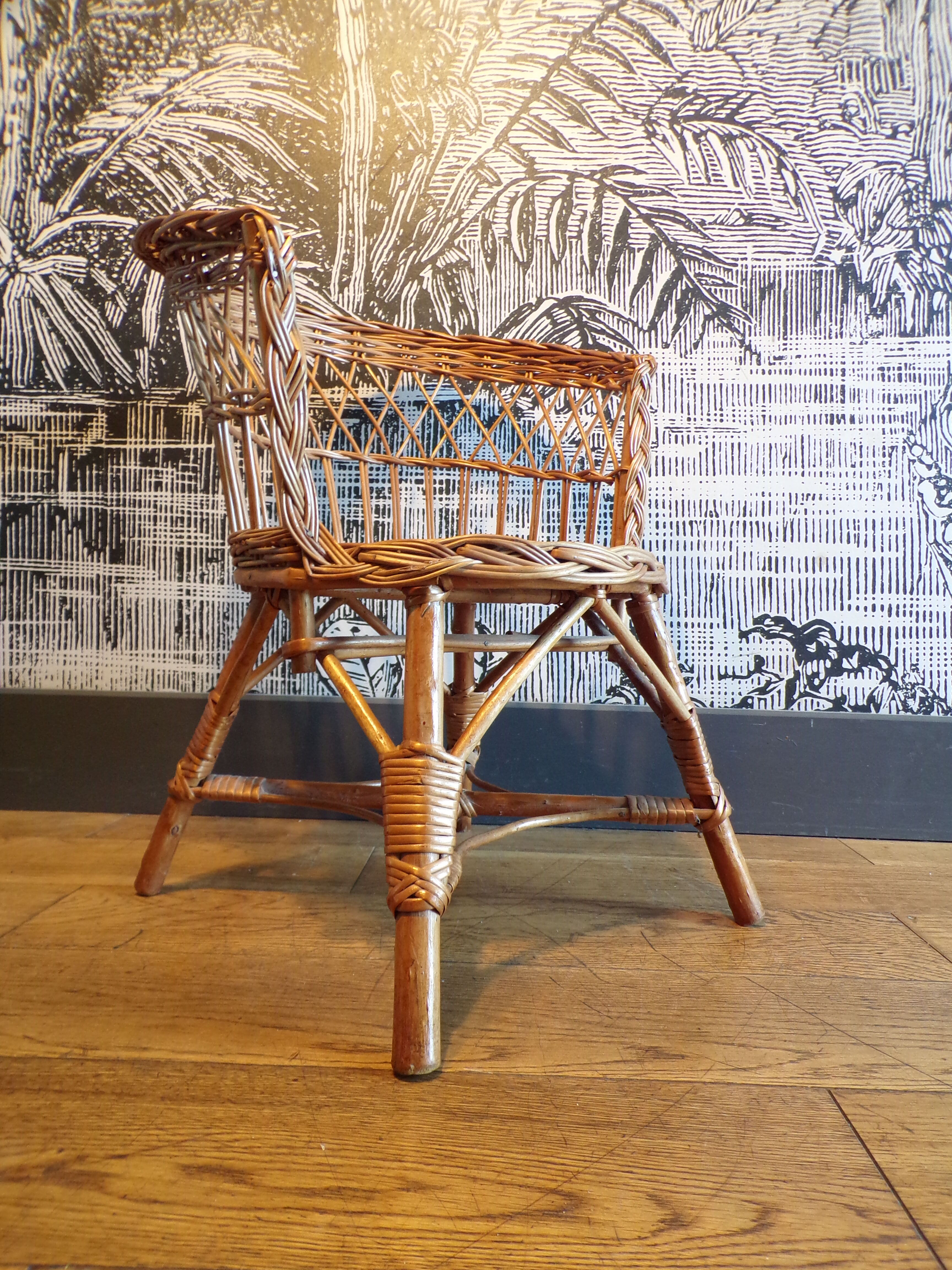 Vintage children's armchair in wicker