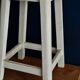 Old white wooden handle stool