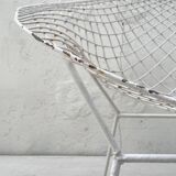 Pair of armchairs in white patinated mesh metal.