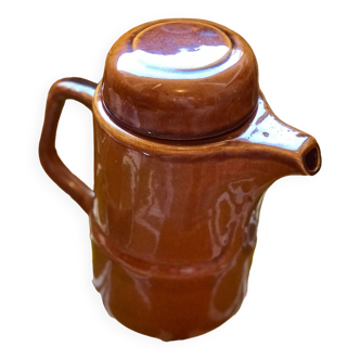 Ocher enameled teapot